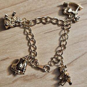 Girls Charm Bracelet Goldtone Christmas Wishes Doll Bear Horse Skates Avon VTG